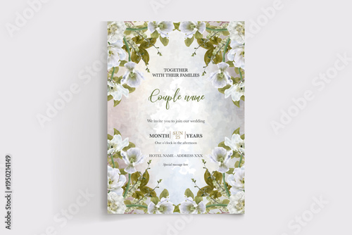 WEDDING INVITATION FRAME WITH FLOWER DECORATIONS AND FRESH LEAVES