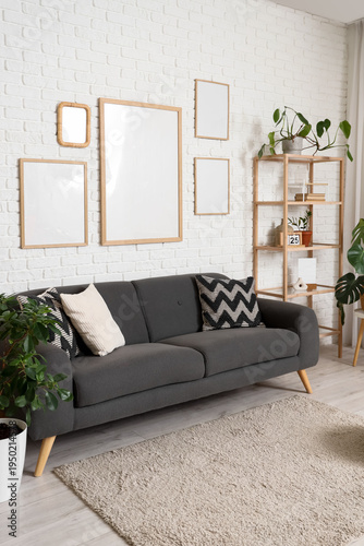 Cozy sofa, shelving unit an...