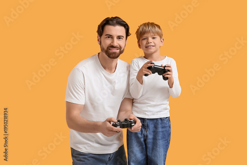 Dad and little son playing ...