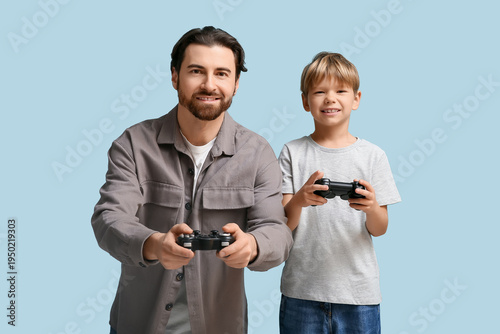 Dad and little son playing ...