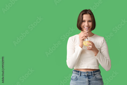 Pretty young woman with gla...