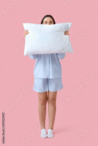 Young woman in blue pajamas...