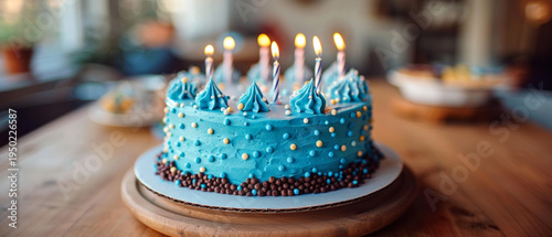 A festive dessert with lit candles and vibrant icing will form the centrepiece of confectionery advertising, providing an appetising backdrop.