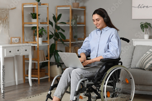 Young woman in wheelchair w...