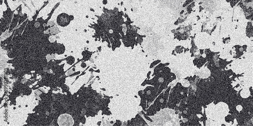 Abstract black ink splatters and drips on a speckled white background creating a chaotic yet artistic distressed texture for grunge or urban design themes