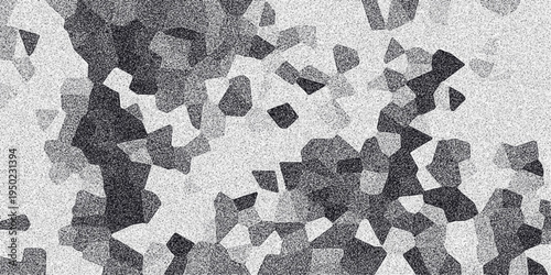 Abstract monochrome background composed of irregular geometric shapes with a speckled texture, creating a mosaic-like and pixelated effect