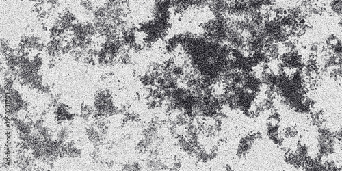 Abstract grayscale textured background with dark speckled clusters against a lighter granular surface creating a dynamic and organic pattern suitable for digital art and design applications