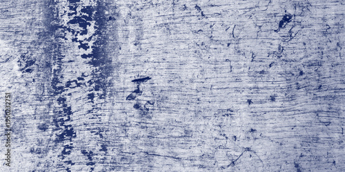 Close-up of a weathered blue and white textured surface with peeling paint and deep grooves, showing signs of age and wear