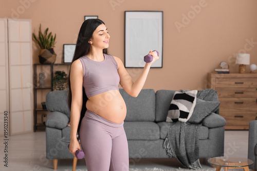 Beautiful pregnant woman do...