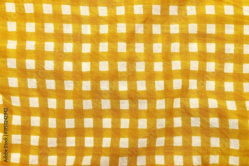White square dots with yellow fabric pattern background