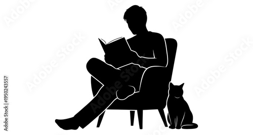 A person relaxes in a chair reading with a cat nearby