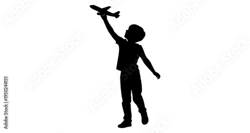 Silhouette of a child playing with a toy airplane against a white background