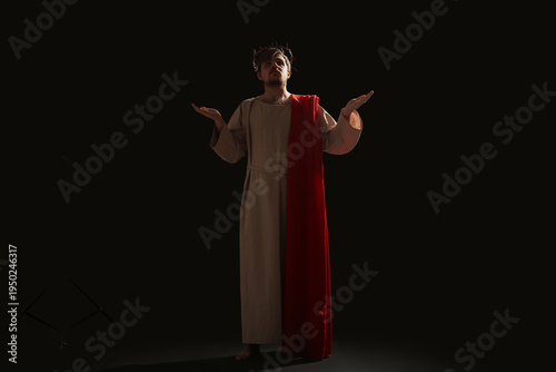 Man in Jesus robe and crown...