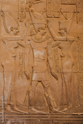 Ancient Egyptian relief carving on sandstone wall