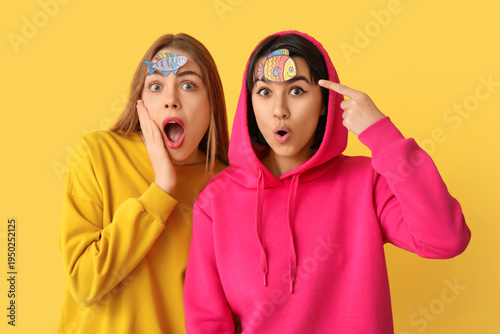 Beautiful young shocked wom...