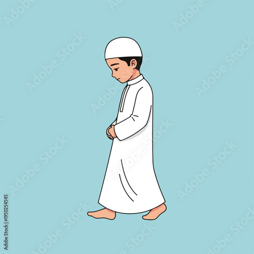Muslim boy in white robe and cap standing barefoot in prayer