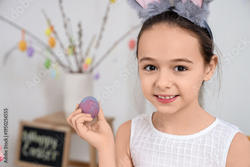 Cute little girl with bunny...