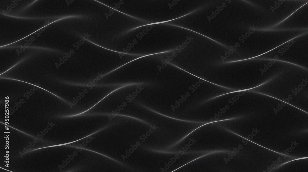 Fototapeta premium The black background with fine folds in the image creates the illusion of fabric falling or blowing dynamically in the wind.