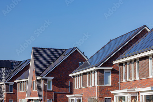 Row of newly built modern luxury family houses in Zwolle, Overijssel