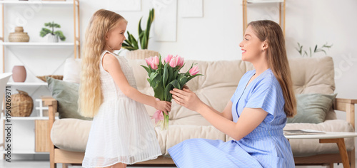 Cute little girl greeting h...