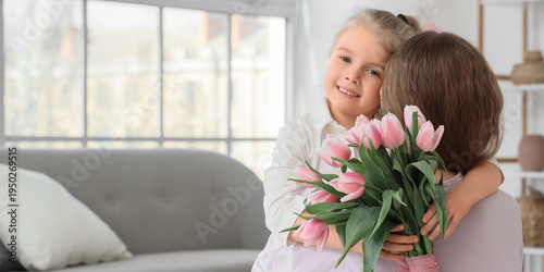 Cute little girl hugging he...