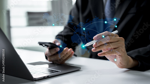 Bilde på lerret Businessman interacting with a global communication network over a world map, representing international business connections, digital communication, and worldwide corporate collaboration
