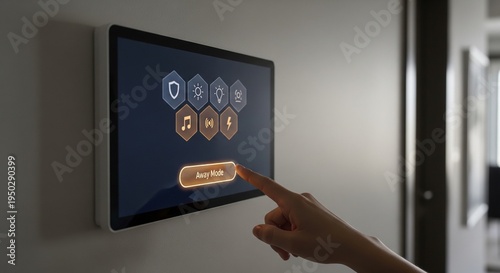 A hand touching a wall-mounted tablet interface to activate 