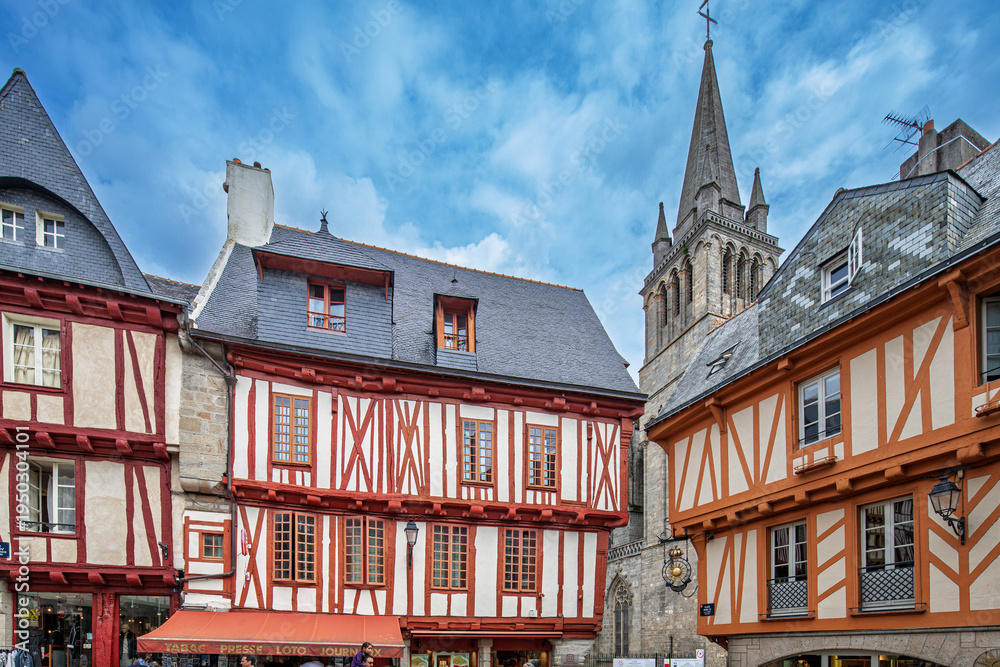 Fototapeta premium Vannes Henry IV Square: Historic Half-Timbered Houses, Cathedral Spire