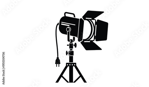 Professional studio spotlight with adjustable barn doors mounted on a sturdy tripod stand equipment