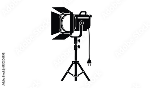 Professional studio light fixture with barn doors mounted on a sturdy adjustable tripod stand