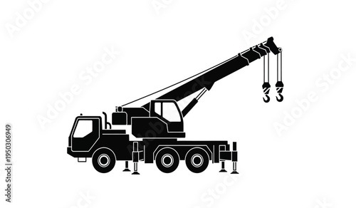 A heavy duty mobile construction crane with an extended telescopic boom and dual lifting hooks