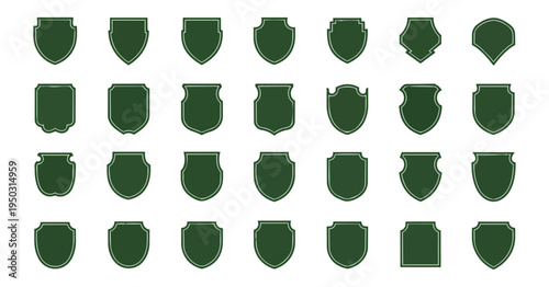 Collection of green shield silhouettes on black background for design