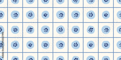 Hand drawn seamless pattern with blue floral circles in a windowpane grid on cream background. Retro-inspired background.