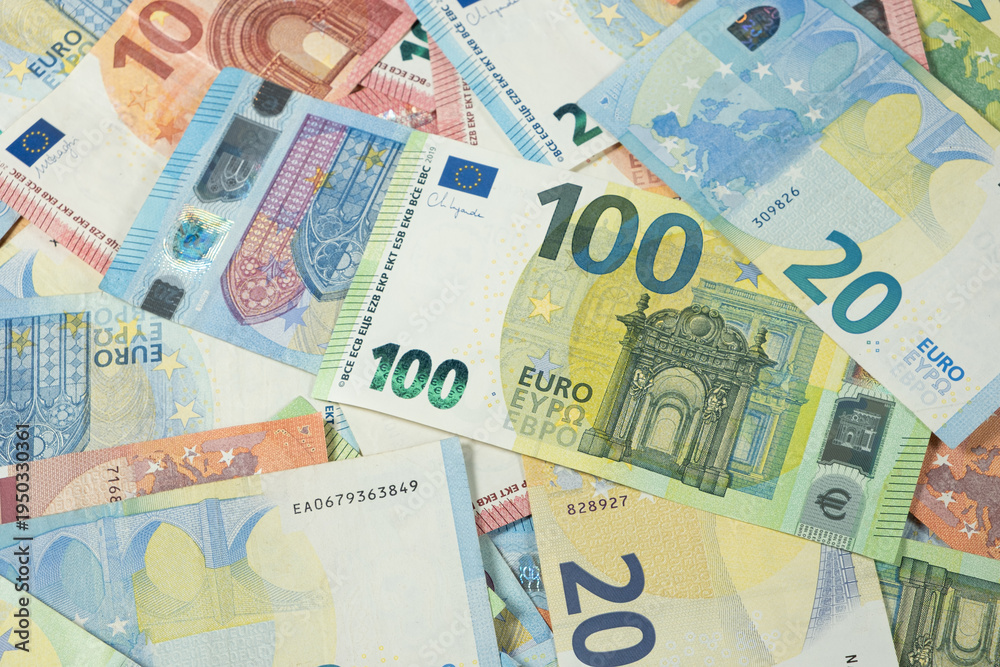 Obraz premium Pile of Euro banknotes of different denominations top view.