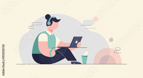 Person wearing headphones uses laptop with drink nearby