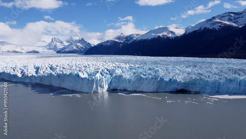 Los Glaciares National Park In El Calafate Santa Cruz Argentina. Stunning View Of Icebergs Breaking Off Into The Water . Nature Travel Destinations Snow Covered Forest Trees.