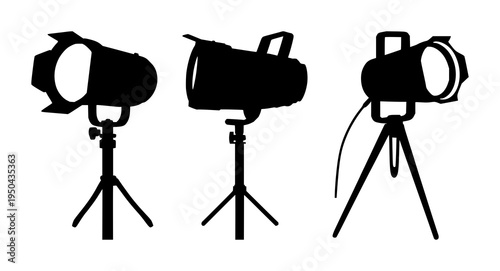 Spotlights set with solid black silhouette of a vintage theatrical spotlight on a stand featuring film noir, precise edges, white background with black silhouette and spotlight