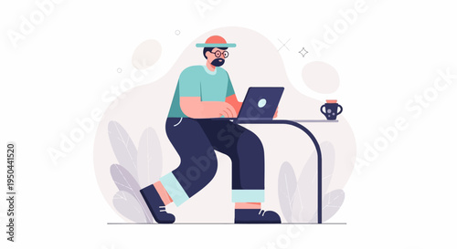 Person in hat and glasses working on laptop at a desk with cup