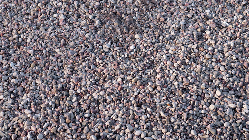 Dense Grey Gravel Surface For Construction, Compacted Foundation Material With Mixed Crushed Stones, Coarse Texture And Drainageready Substrate, Industrial Site Aesthetic Conveying