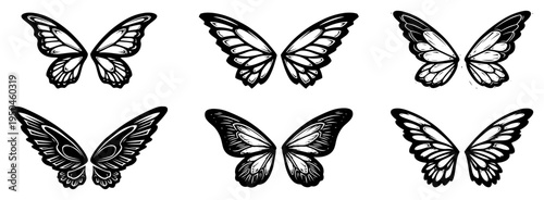 Set of decorative butterfly wings in symmetrical black and white line art