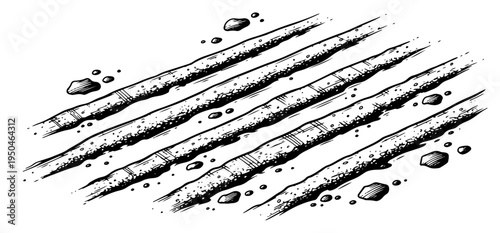 Hand drawn parallel lines of powder or sand on a flat surface