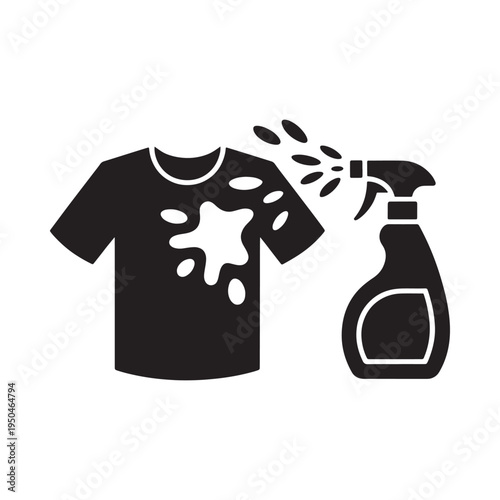 A t shirt being sprayed with cleaning solution to remove stains