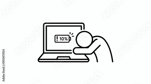 Man leaning on laptop screen showing low battery warning  