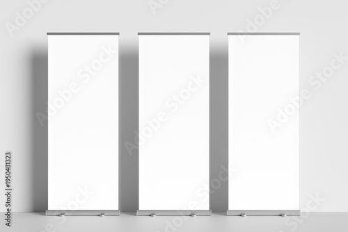 Blank mockup of a roll-up banner display for marketing and conferences. White roll-up display with gray background.