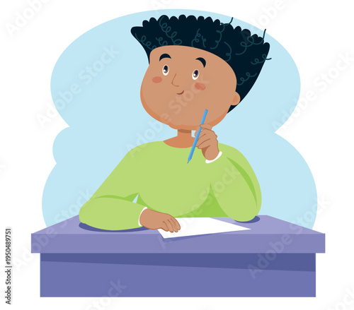 Cute schoolboy sitting at the desk and writing with a pen, child doing homework or studying.