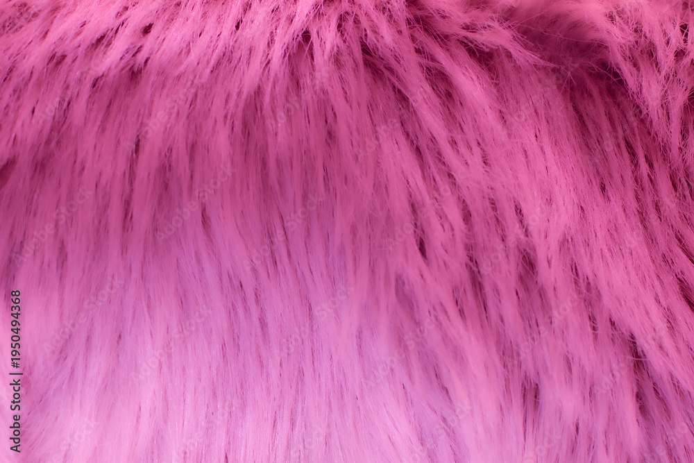 Obraz premium Pink fluffy synthetic fur texture macro textile surface