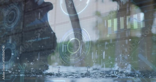 Puddle receiving raindrops, forming repeating ripples while HUD mapping for weather monitoring