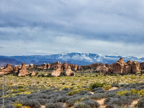 Dramatic sky looms over rugged desert landscape
