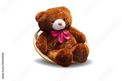 Photos brown teddy bear in basket isolated on white background