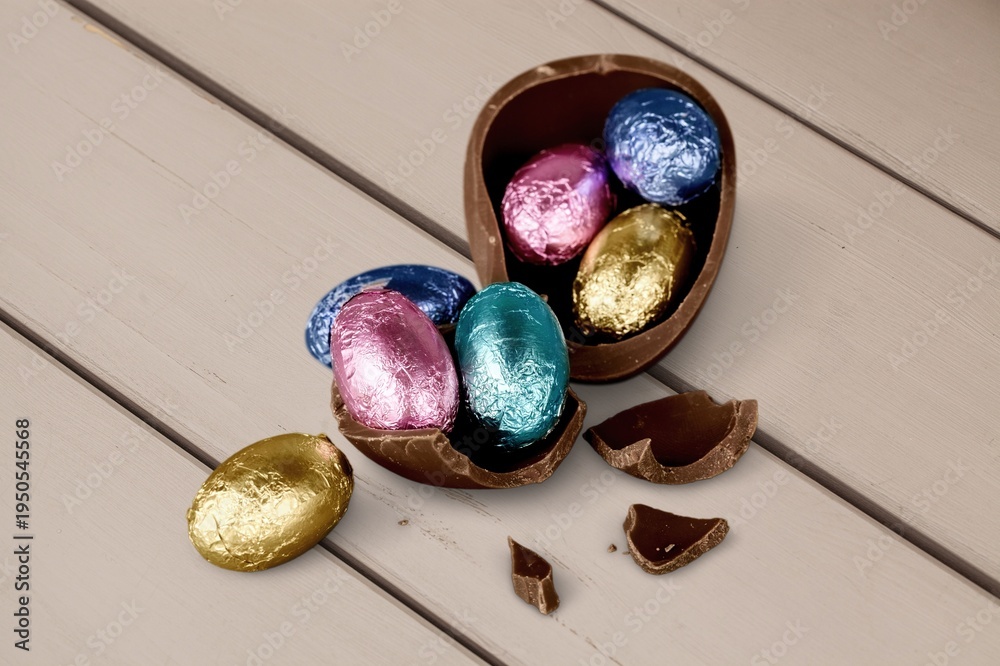 Fototapeta premium Chocolate easter egg on desk backgrouund